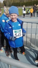 Miko maalissa 1km pyrähdyksen jälkeen.