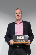 HSU teko SM-moniotteluiden kilpailujohtajalle Erkki Tenkulalle