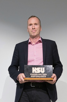 HSU teko SM-moniotteluiden kilpailujohtajalle Erkki Tenkulalle