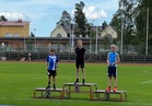 Akseli ja Iivo palkintopallilla