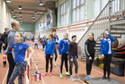 T13-sarjan HSUn kilpailijat lämmittelevät vauhditonta 3-loikkaa varten